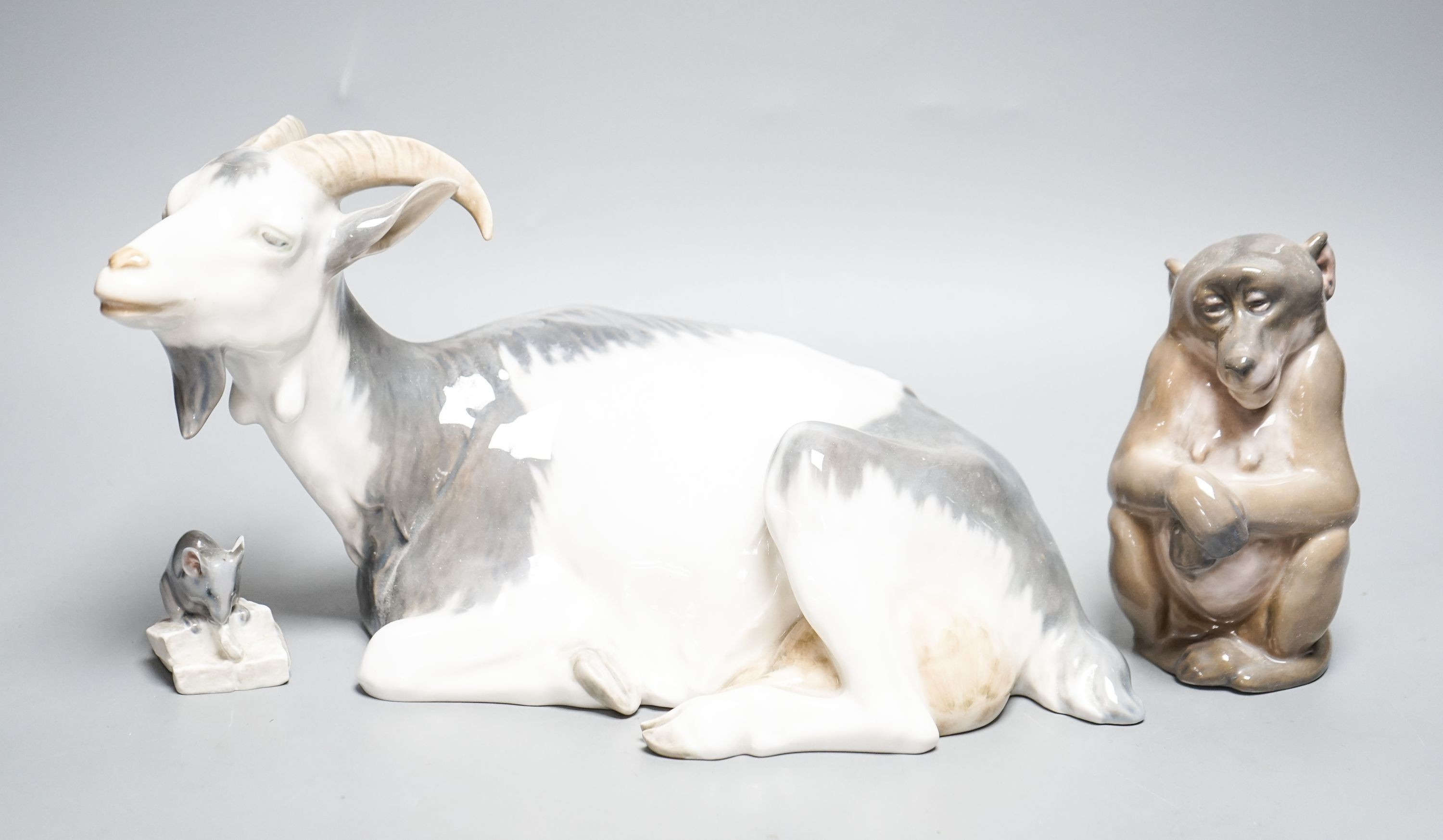 A Royal Copenhagen model of a goat, a mouse and one of a monkey, largest 28cm long